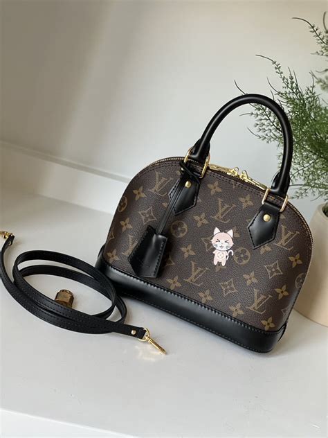 louis vuitton alma bb world tour black